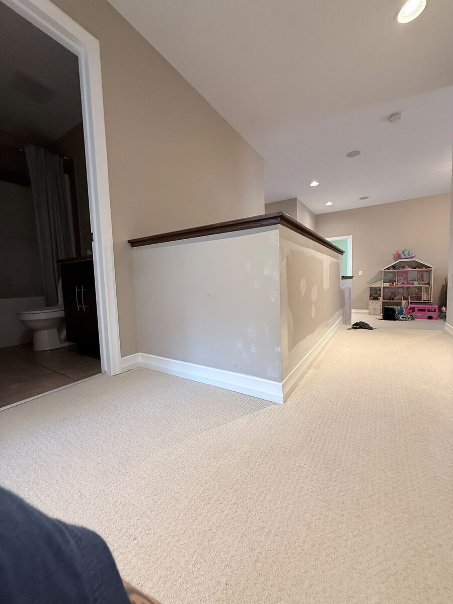Half-wall drywall repair before paint in a Calgary unit